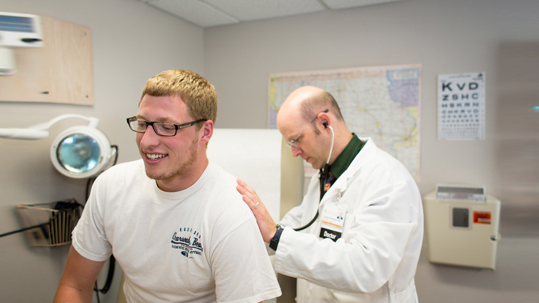patient and doctor in medical office